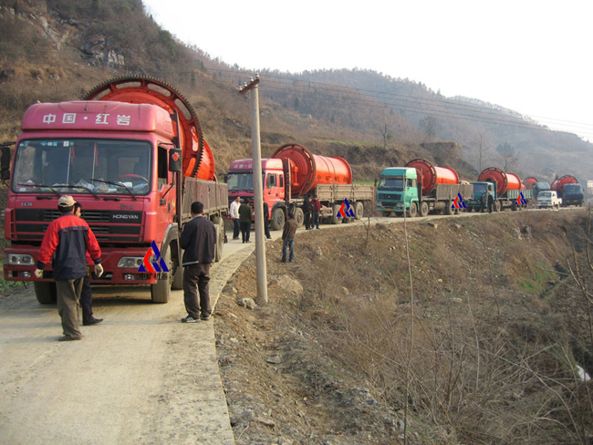 Ball mill in operation showing grinding media and material flow