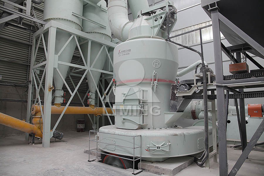Close-up of ultra-fine white limestone powder being used in an industrial manufacturing process