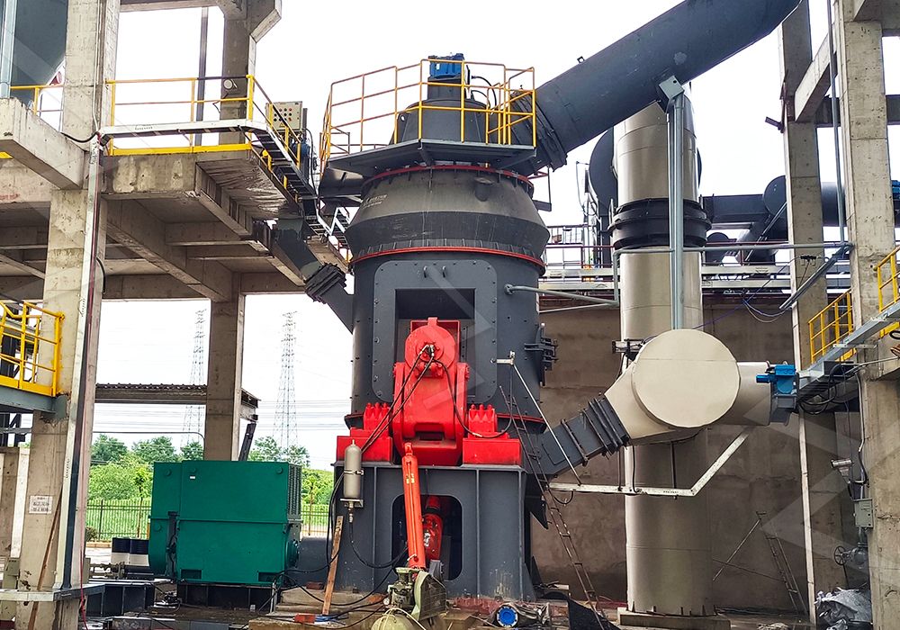 Diagram showing key components of a vertical roller mill, including the grinding table.