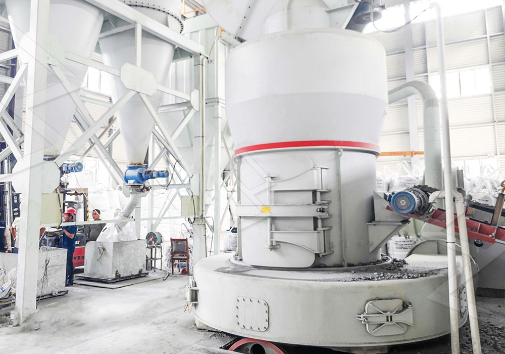 Used grinding mill machine in a factory setting