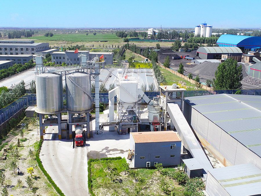 Vertical mill processing slag in an industrial setting