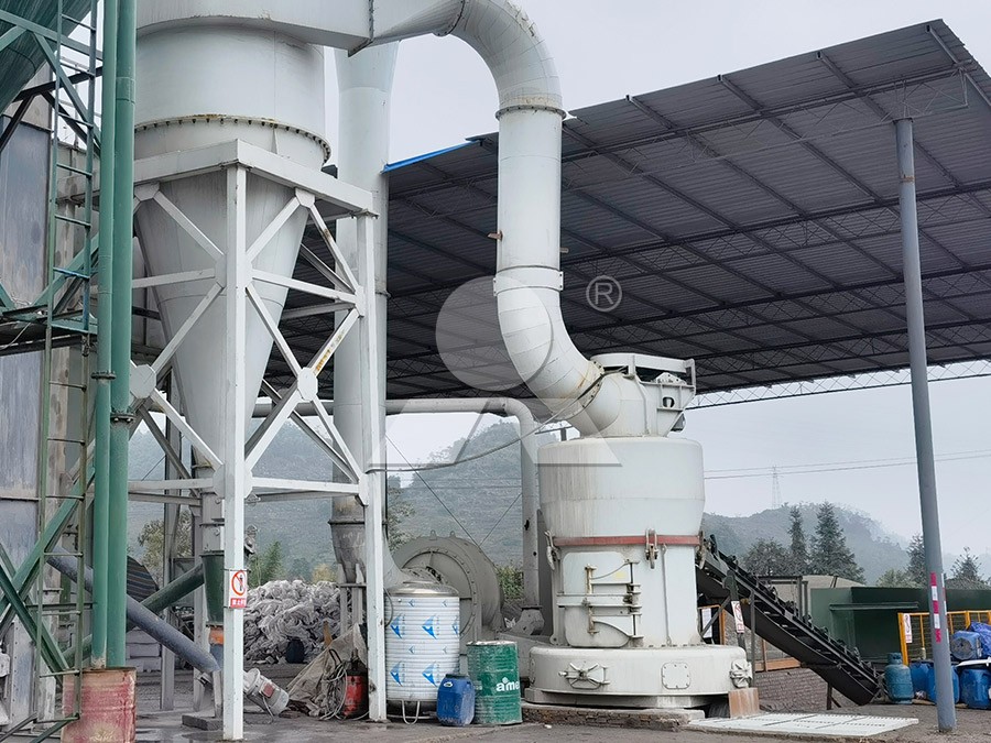 Large jaw crusher processing limestone in cement plant quarry