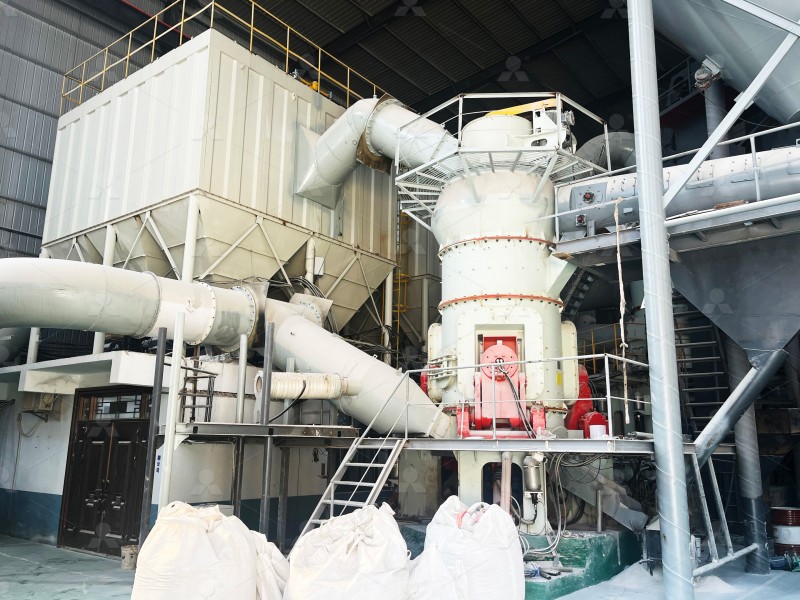 Vertical roller mill grinding granulated blast furnace slag in an industrial setting