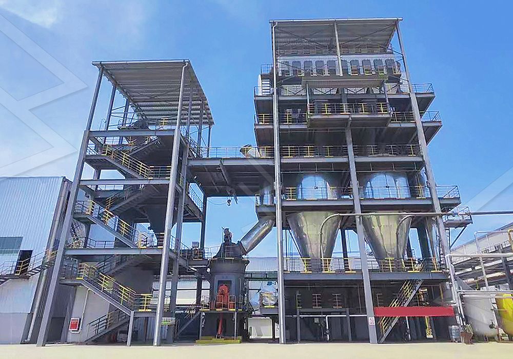 Industrial installation of a large vertical grinding mill in a mineral processing plant