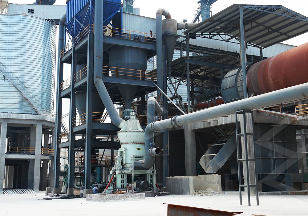 Modern industrial plant with vertical grinding mills for kaolin processing