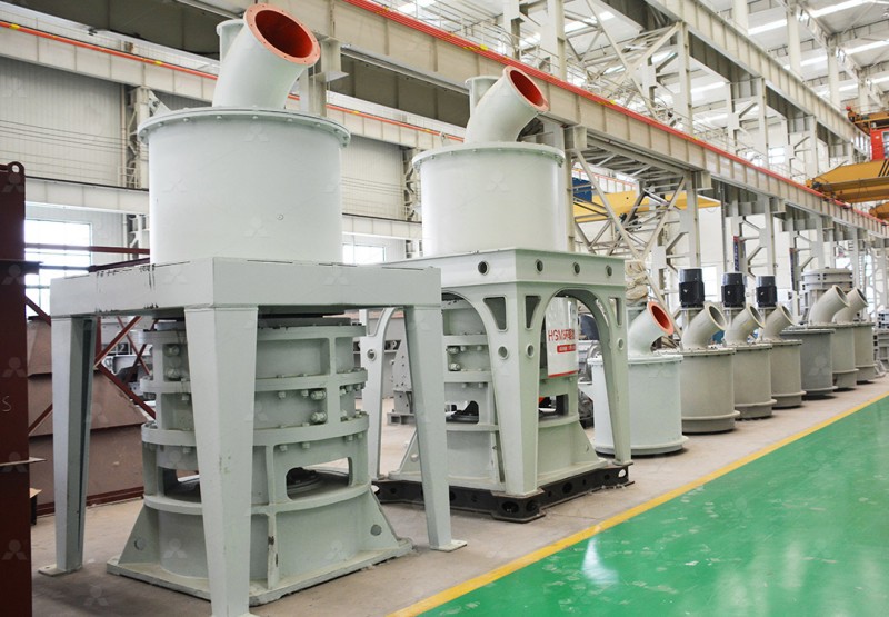 Closcup of the MW Ultrafine Grinding Mill grinding chamber during brucite processing, showing roller and ring assembly