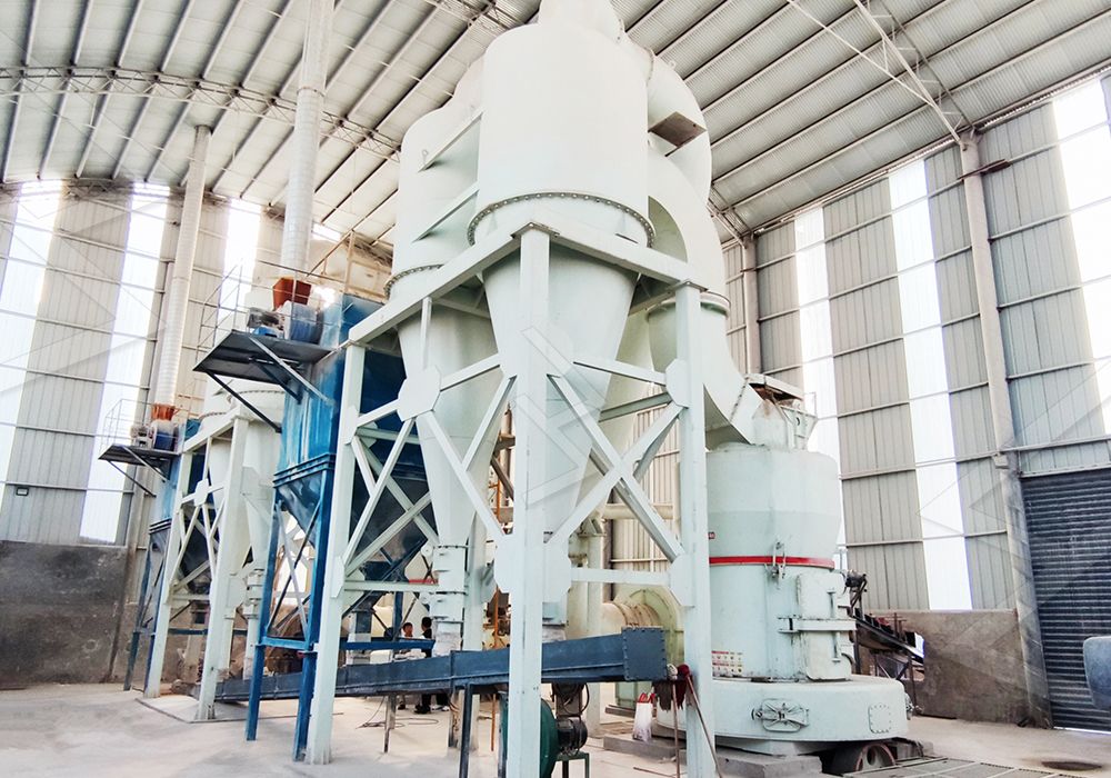 Overview of a stone quarry grinding mill plant with supporting equipment like crushers and elevators