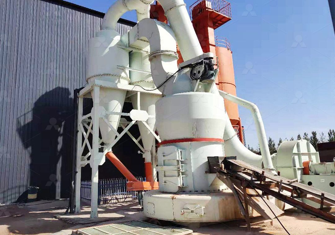 Close-up of fine limestone powder being collected in a grinding mill system