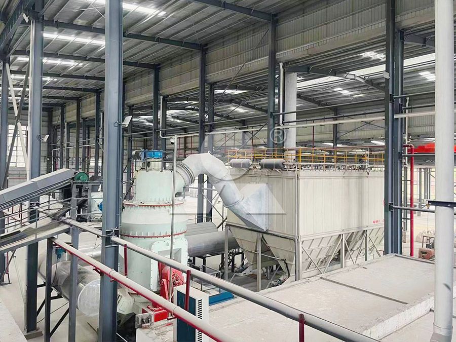 Various raw materials being processed in universal grinding mill including limestone and slag